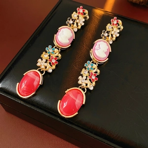 Vintage palace style cameo earrings with enamel flowers and red oval gemstones