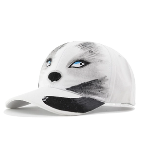 Detailed view of realistic husky print with blue eyes on a white cotton baseball cap