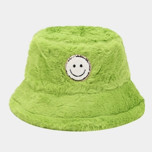 Neon green plush bucket hat with fluffy faux fur and sequined smiley face patch