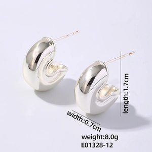 Detail view of silver C-shaped hoop earrings showing 1.7cm length and 0.7cm width dimensions