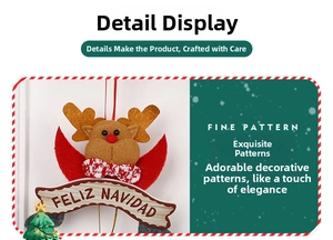 Close-up of a felt reindeer Christmas ornament with Feliz Navidad wooden sign