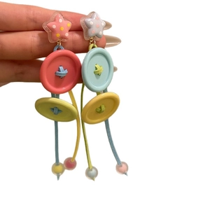 Colorful bohemian star button tassel earrings with vibrant multi-layer handmade fringe