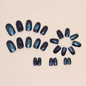 Elegant deep blue cat-eye oval press-on nails set with gradient starry sky effect