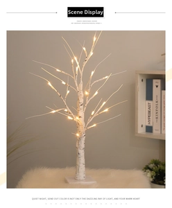 Detail of warm yellow LED lights on white birch tree bark texture for holiday decor