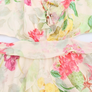 Robe longue fleurie pour femme avec découpe à la taille et détails de liens perlés