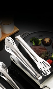 Thickened stainless steel steak tongs with slotted design for grilling and cooking