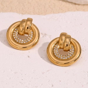Detail view of 18K gold plated double loop earrings with sparkling zircon inlay
