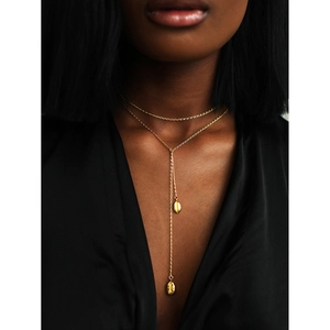 Elegant 18k gold plated double layer Y-necklace with shell pendants on female model