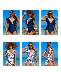 Detailed views of deep V-neck swimsuits with white lace trim and palm leaf patterns