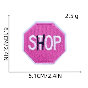 Detail view of pink octagonal SHOP embroidered patch with size markers and dimensions
