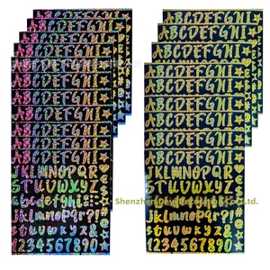 Close-up of holographic 1-inch glitter vinyl alphabet and number stickers for scrapbooking