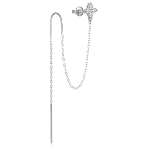 Macro shot of silver four-leaf clover earrings with zircon inlay and chain detail