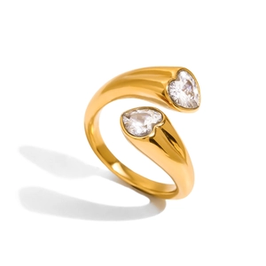 Detail of 18k gold plated Toi et Moi open ring featuring dual heart-shaped zircons