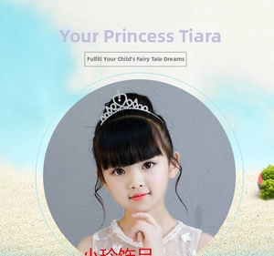 Detailed view of children's silver tiara headband with heart-shaped white rhinestones