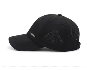 Close-up of black breathable mesh baseball cap featuring FASHION text and laser cut vents