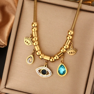 Collier double couche plaqué or 18K avec pendentif goutte bleue et breloques œil grec