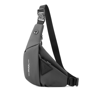 Waterproof dark gray minimalist sling bag with durable shoulder strap and earphone port