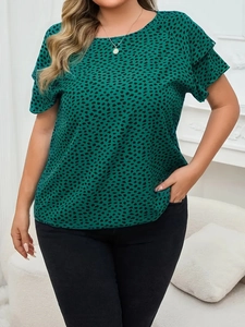 Detail of dark green leopard print top featuring ruffle sleeves and slim fit round neck
