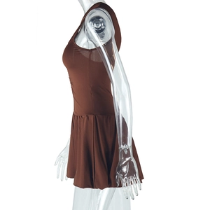 Detail of dark brown one-shoulder dress with pleated A-line skirt and glossy finish