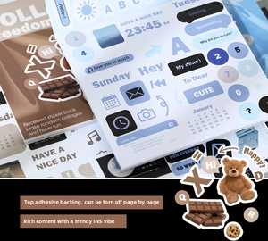 Macro view of vintage INS style deco stickers book with blue and brown design elements