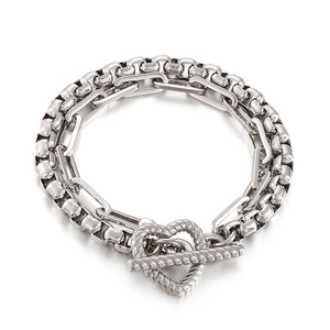 Double-layered silver stainless steel bracelet with heart-shaped OT clasp and twisted details
