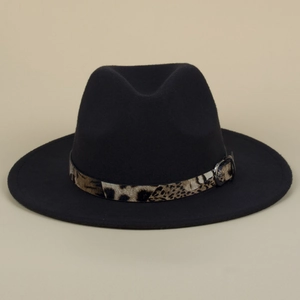 Detail of a black wide brim felt hat featuring a leopard print belt and metal buckle