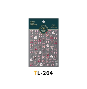 Detailed view of TL-264 nail stickers with pink bows, cherries and rabbits