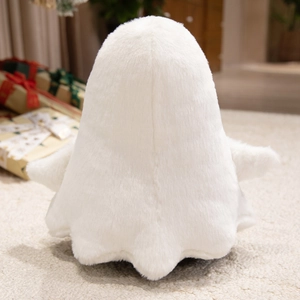Back view of cute white plush ghost toy showing soft long hair texture on a cozy rug