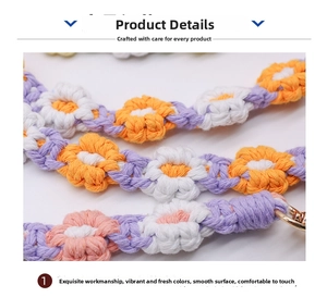Close-up of handmade crochet flower strap with gold lobster clasps and colorful cotton weave