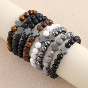Beaded bracelets set with stone, volcanic lava, wood beads and hematite cross pendants