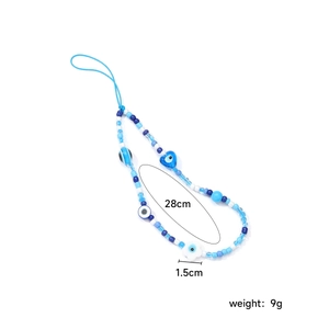 Blue beaded phone strap with evil eye and heart charms, measuring 28cm in length