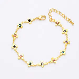 Gold cross bracelet with colorful evil eye beads and adjustable lobster clasp chain