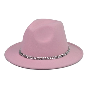 Detail of pink wool fedora with a thick silver metal chain accessory on flat wide brim