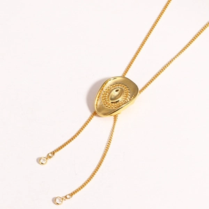 Detailed close-up of golden cowboy hat pendant with adjustable bolo tie slider