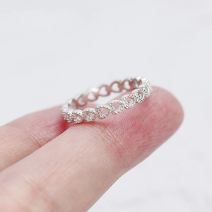 Elegant 925 sterling silver open ring featuring a delicate hollow heart-shaped pattern