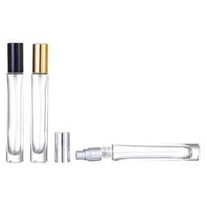 Detailed view of 10ml glass perfume spray bottles with gold, silver and black caps