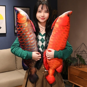 Detailed scale texture and vibrant colors of the large plush golden dragon fish pillow shell