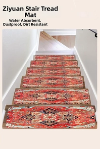 Macro detail of red Persian style non-slip stair treads on wooden steps showing fabric texture