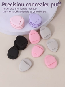 Mini finger concealer sponges in water-drop shapes with elastic straps for precise makeup