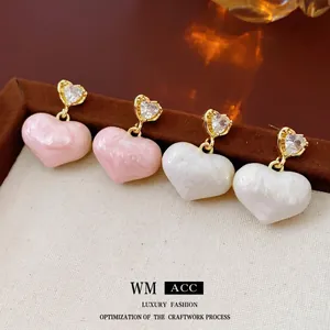 Elegant gold plated heart drop earrings with marble texture in pink and cream white