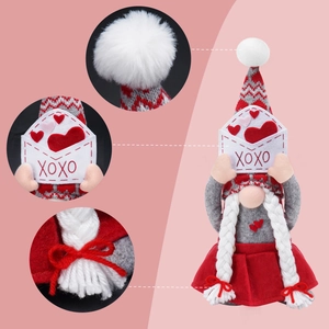 Detail of Valentine gnome plush with XOXO envelope and braided beard textures