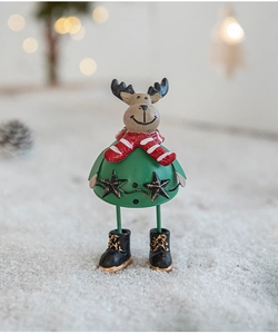 Close-up of cute green Christmas reindeer ornament with red scarf on snowy background