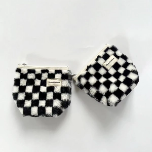 Two-piece winter plush checkerboard cosmetic bags with classic black and white pattern