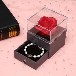 Luxury rose jewelry box with pearl clover bracelet and clear acrylic gift lid