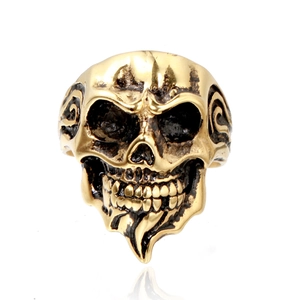 Men's punk skull ring in golden stainless steel with polished finish on white background
