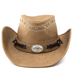 Brown leather western cowboy hat with silver bull head emblem and wide upturned brim