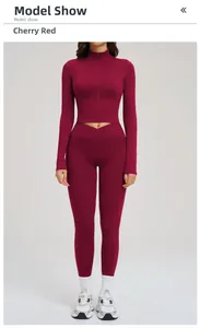 Macro detail of cherry red yoga set featuring high-waist V-belt and zip-up jacket