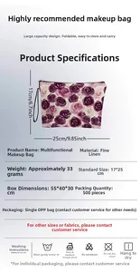 Detail view of purple rose makeup bag showing 17x25cm dimensions and fine linen texture