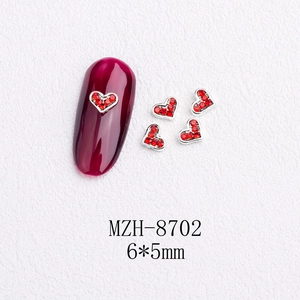 Detail of red heart nail charm with silver metal base and 6x5mm size specification