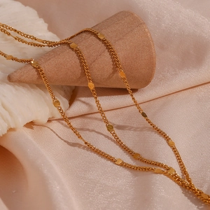 Chic 18K gold plated stainless steel layered necklace with small sequin charms on silk